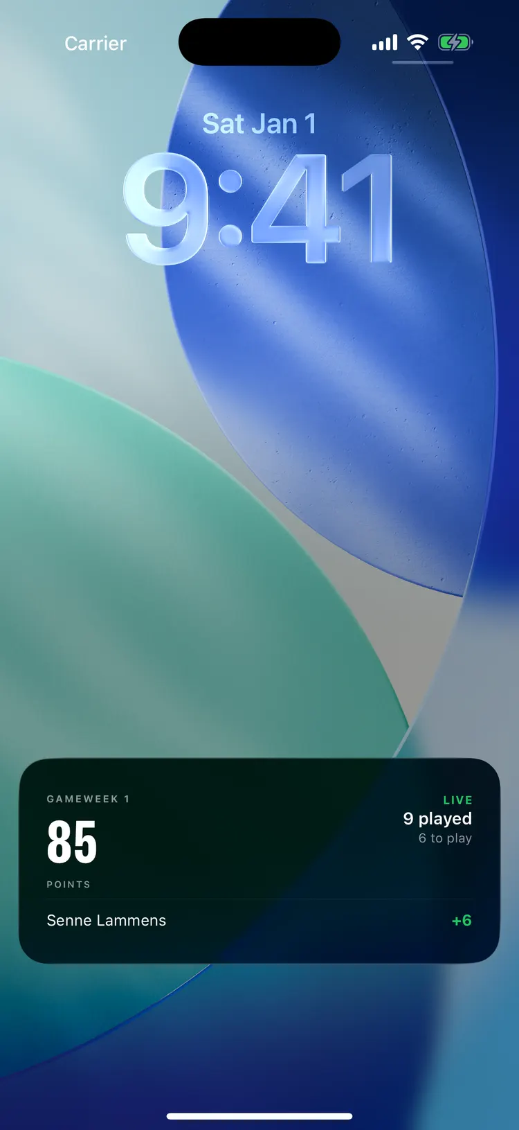 iPhone Lock Screen showing the FPL Now Live Activity: Gameweek 1, 85 points, LIVE, 9 played and 6 to play, with a scoring event — Senne Lammens plus six points — listed beneath the score.